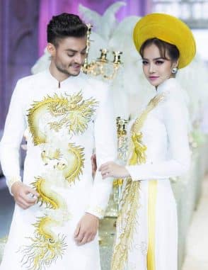 Áo dài cưới trắng vẽ rồng phượng sang trọng