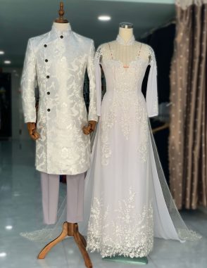 Cặp áo dài cưới trắng chú rể gấm rồng, cô dâu kết ren