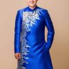 Áo dài nam cách tân xanh lam họa tiết rồng bay lượn